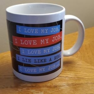 "I love my job. I lie like a rug" coffee mug